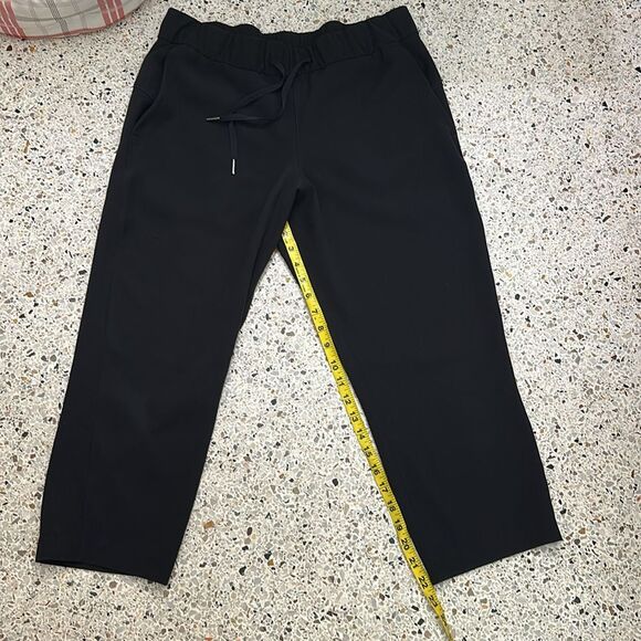Lululemon On the Fly Crop pants drawstring black 10 woven - Picture 7 of 9